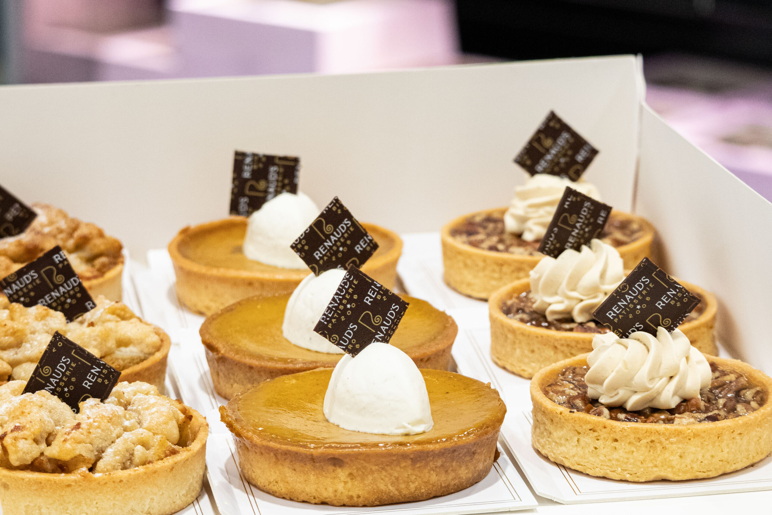 9 individual cakes in a box